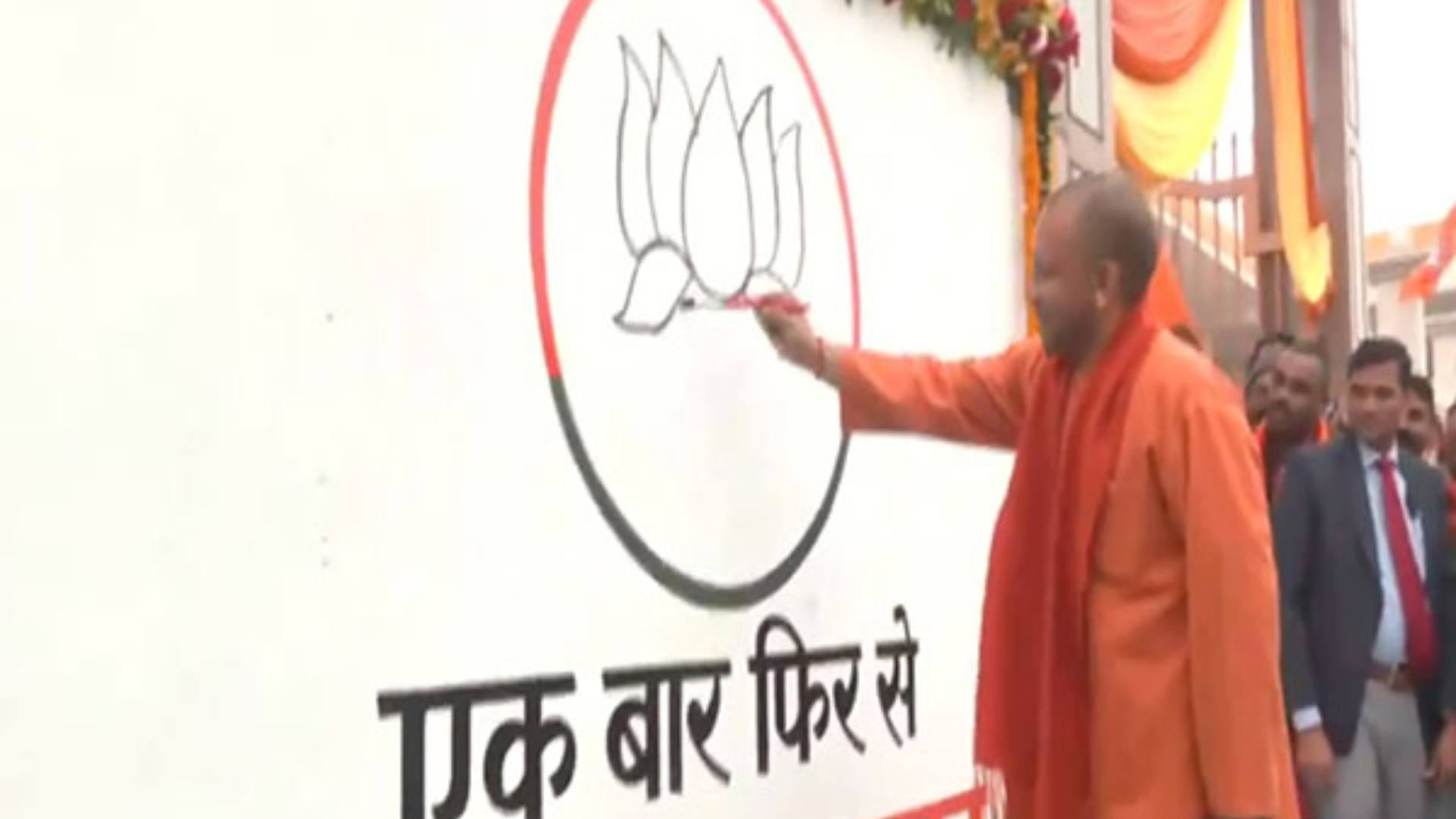 CM Yogi Participates in BJP’s ‘Ek Baar Phir Se Modi Sarkar’ Wall Writing Campaign