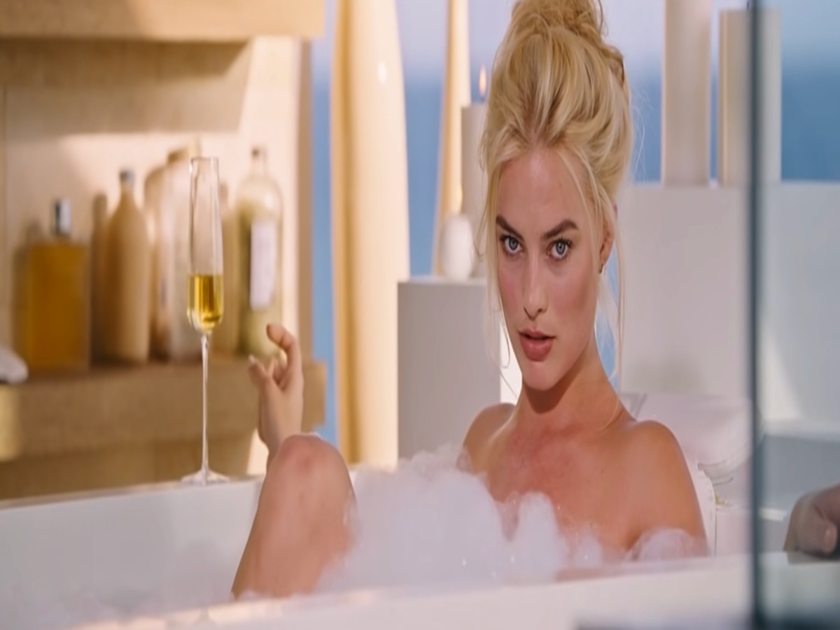 Margot Robbie in a bubble bath scene from The Big Short, showcasing her beauty