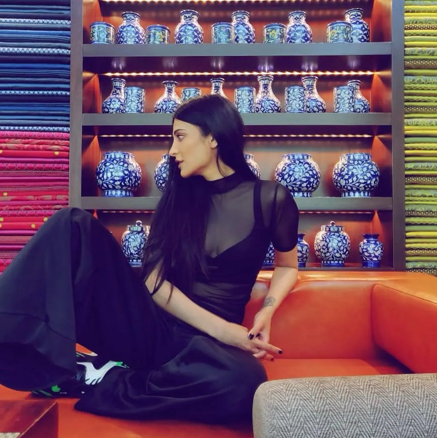Shruti Haasan in a stylish outfit from her recent photoshoot, striking a confident pose.