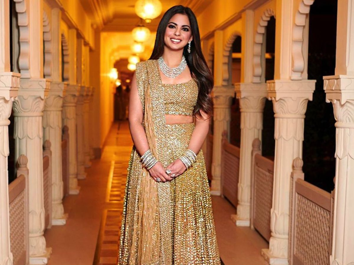 Golden sequin lehenga by Abu Jani