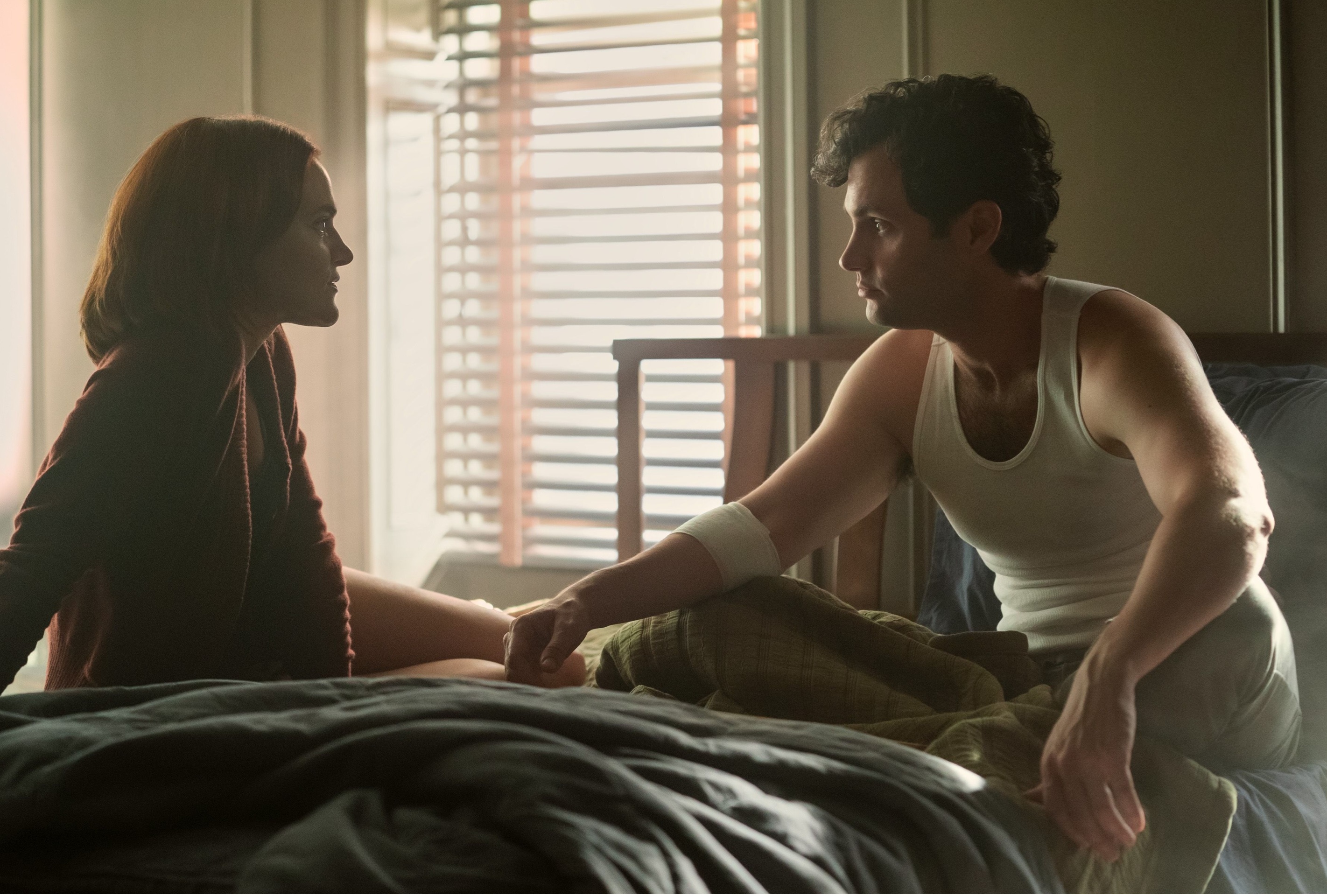 “Love Quinn on top of Joe Goldberg, holding him down with a necktie in his mouth—capturing a bold reversal of control.”