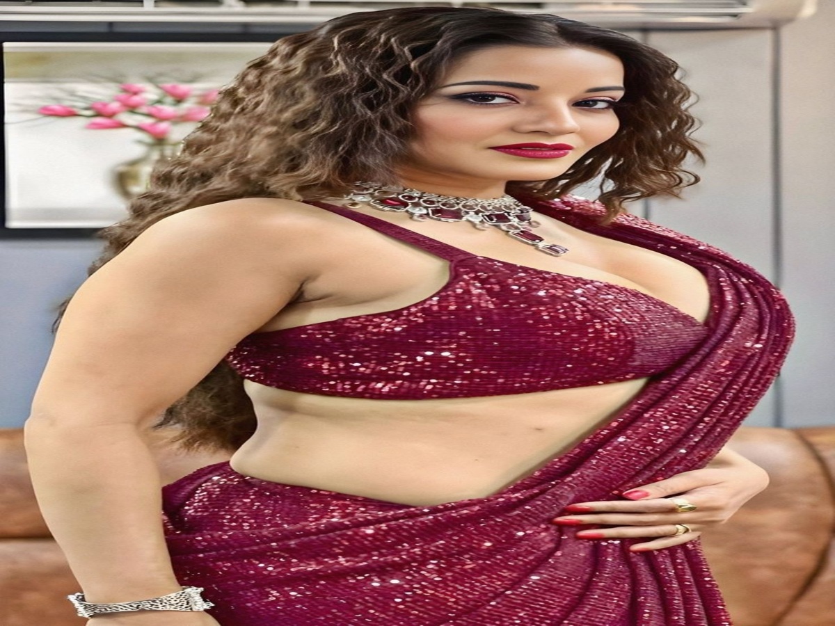 Monalisa, the famous Bhojpuri actress, posing elegantly, highlighting her charm and talent in the film industry.