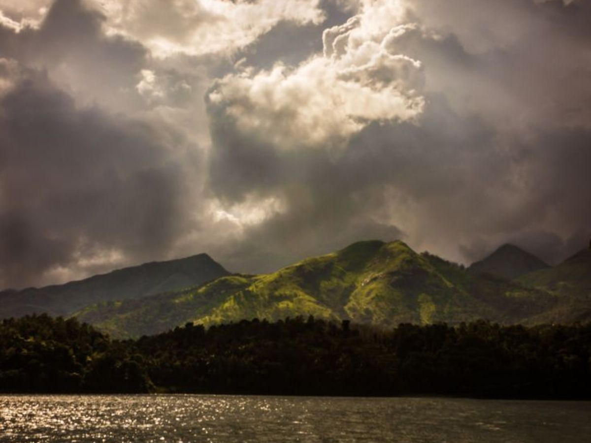 Foggy hills and scenic lakes in Wayanad during monsoon