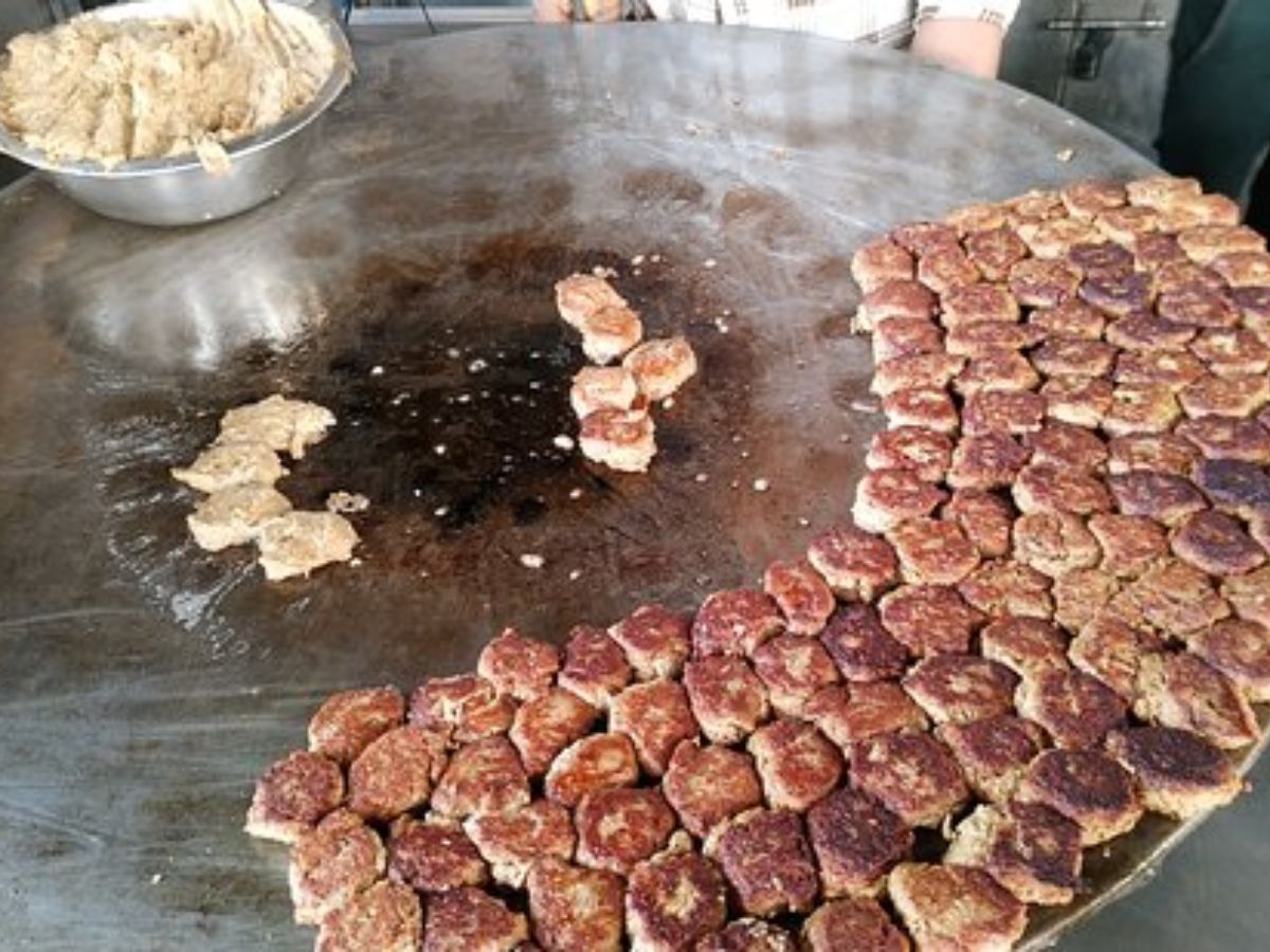 Plate of galawati kebabs with paratha served fresh at Tunday Kababi.