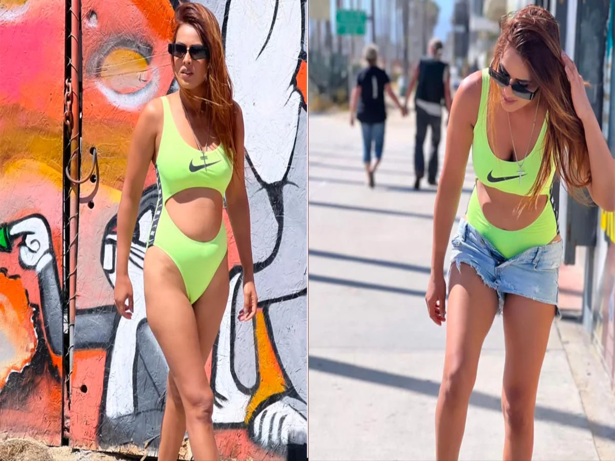Nia Sharma showcasing a fiery look in a neon bikini