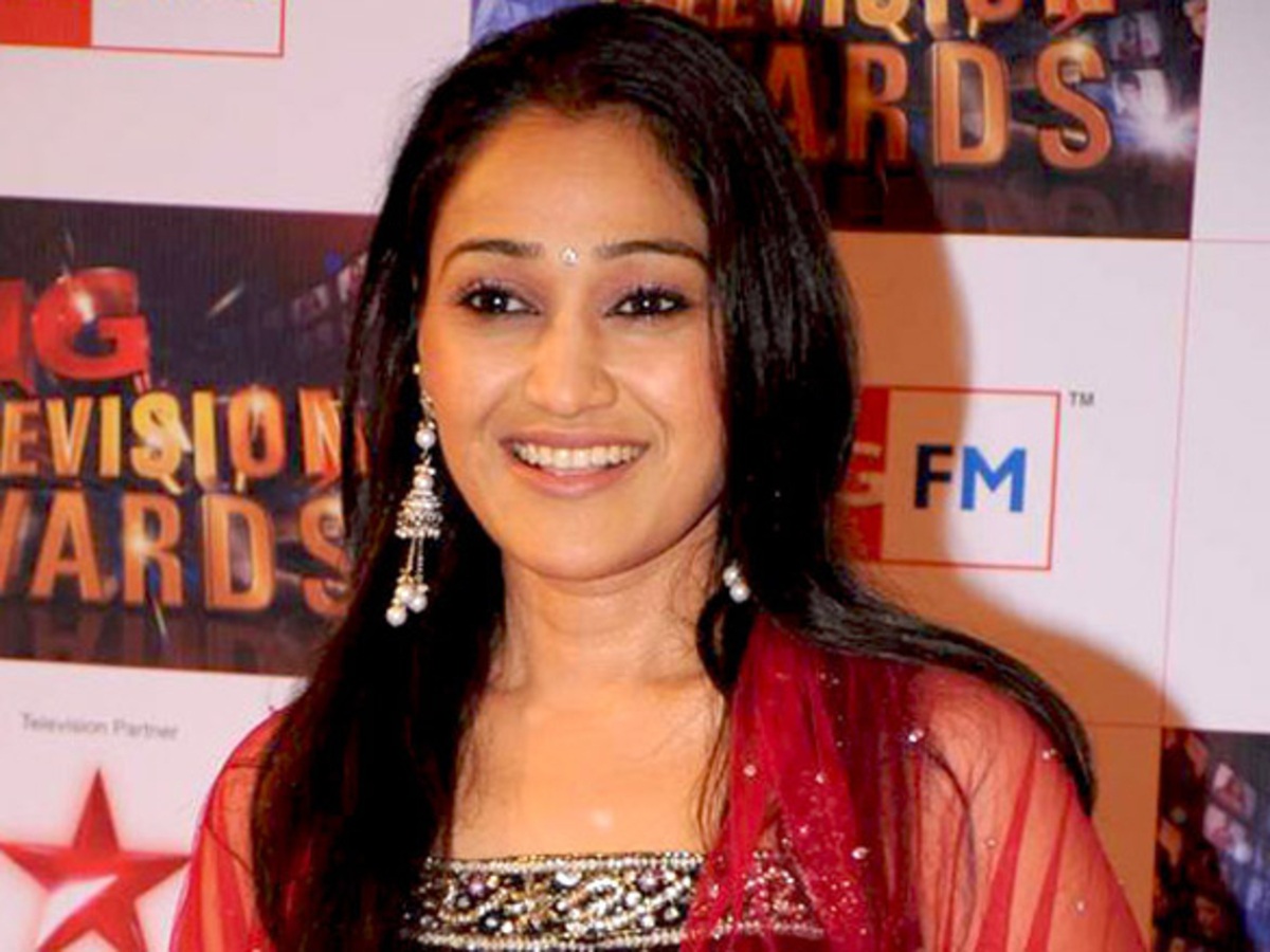 Disha Vakani smiling, representing her successful journey from B-grade films to a prominent television career.
