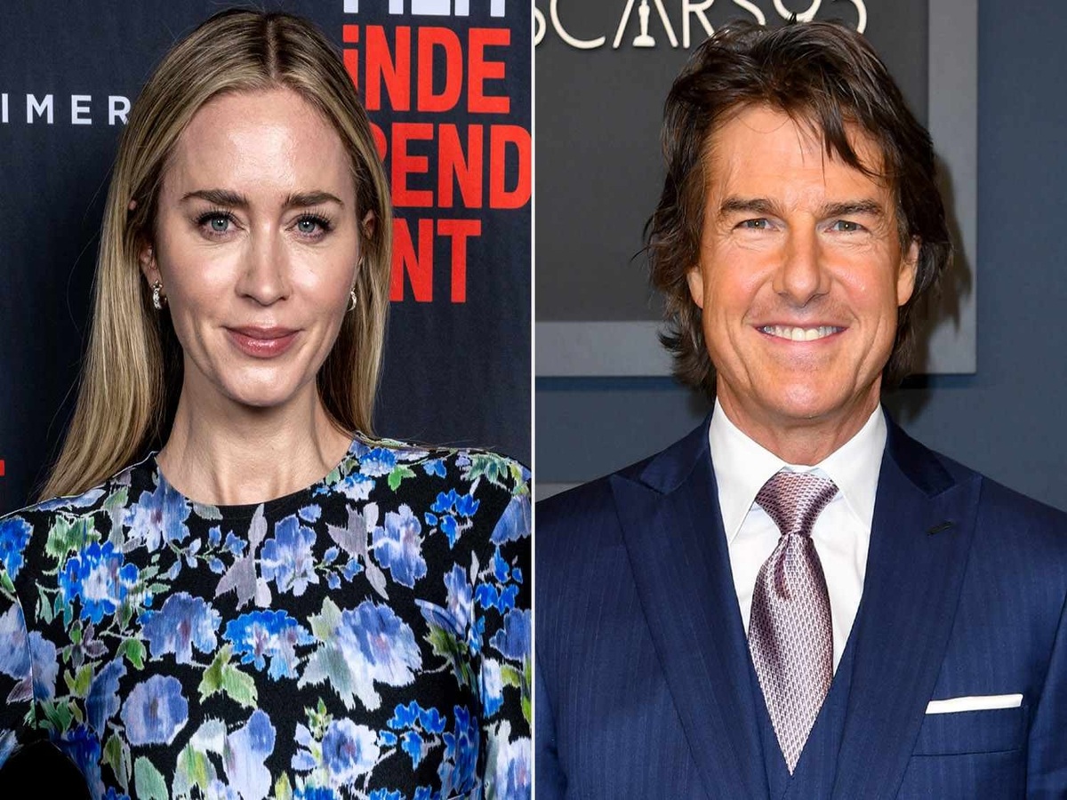 Emily Blunt kissing Tom Cruise in a farewell scene from "Edge of Tomorrow," showcasing a spontaneous moment that wasn't scripted but added significant emotional weight to the film.