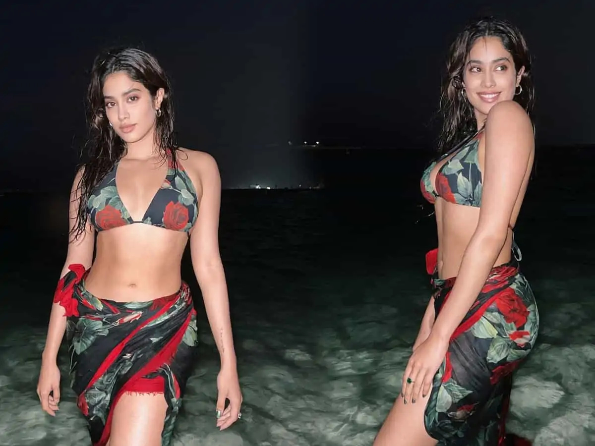 Janhvi Kapoor posing in a stylish floral bikini