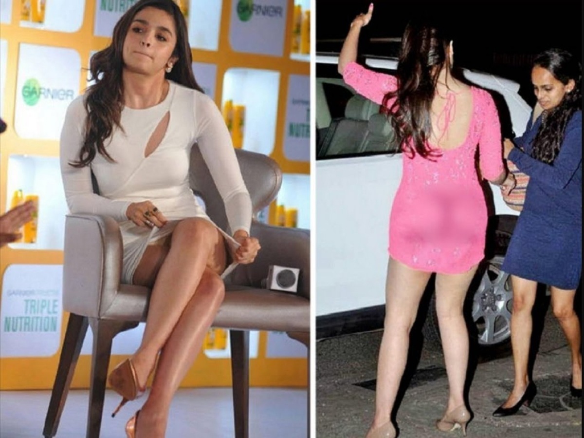 Alia Bhatt wearing a white short dress during an event, experiencing a wardrobe malfunction.