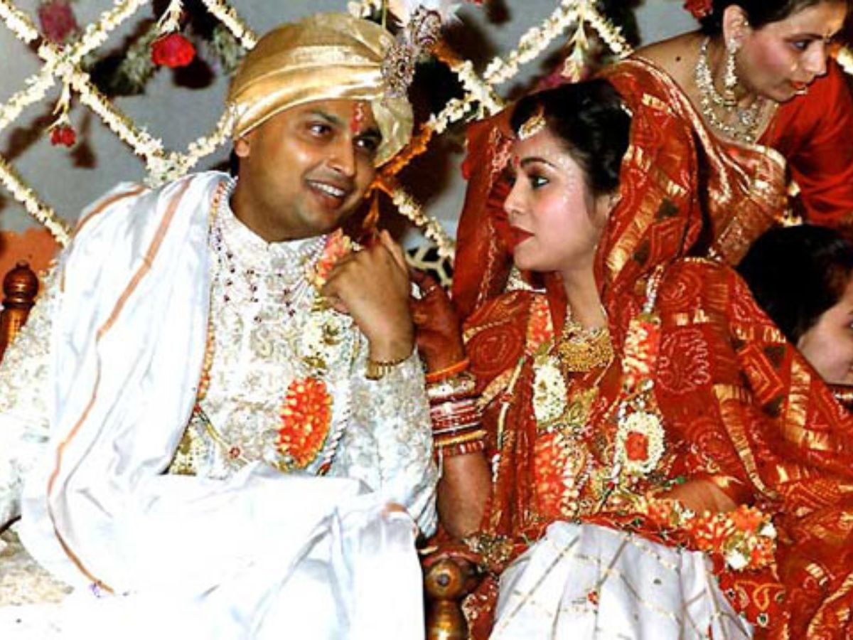 Wedding day photo of Anil and Tina Ambani in traditional attire.