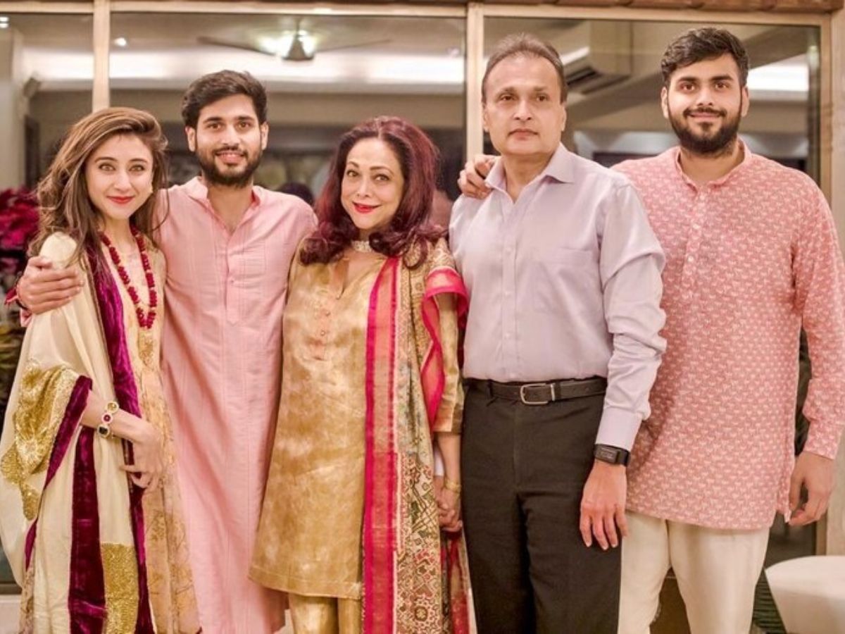 A family portrait of Anil and Tina