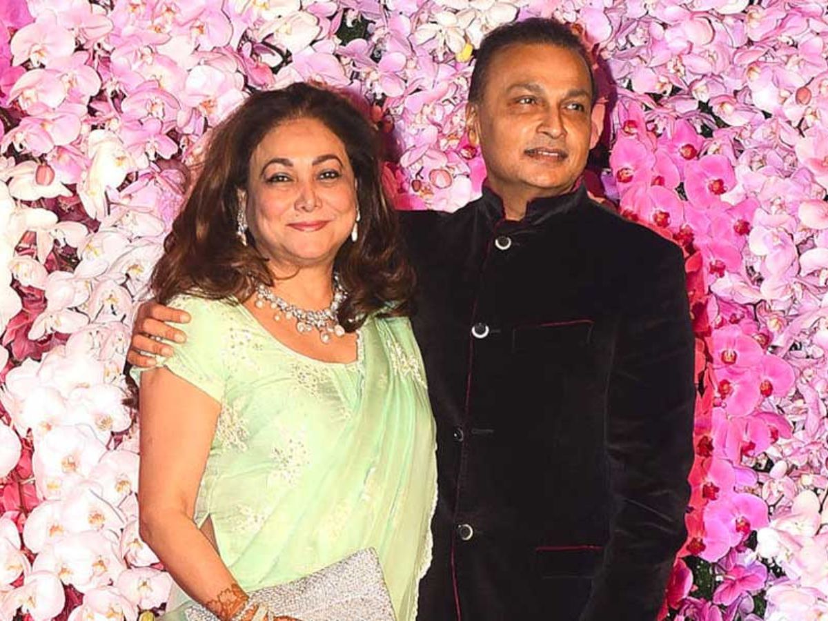 Anil and Tina sharing a candid moment at a private function.