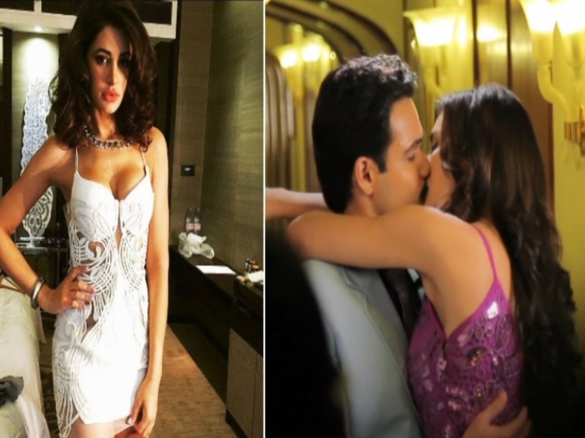 Emraan Hashmi and Nargis Fakhri sharing a playful kissing scene