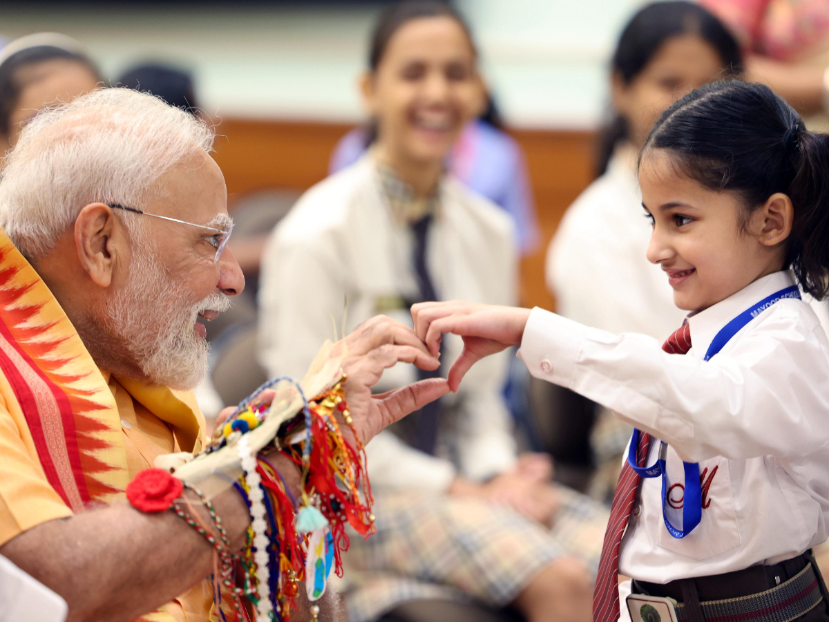 In Pics: Cute Pics Released Of PM Modi Celebrating Rakhi With School Kids