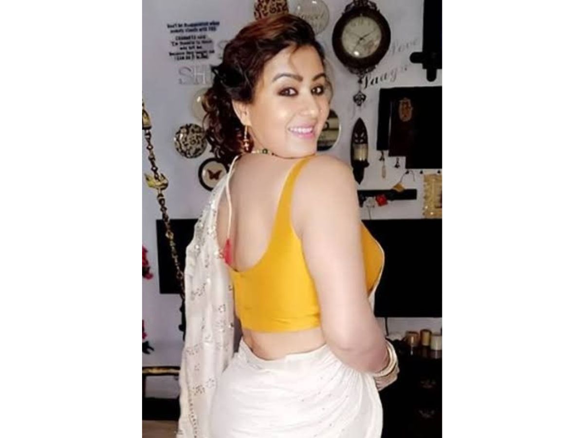 Backless Yellow Blouse and White Saree