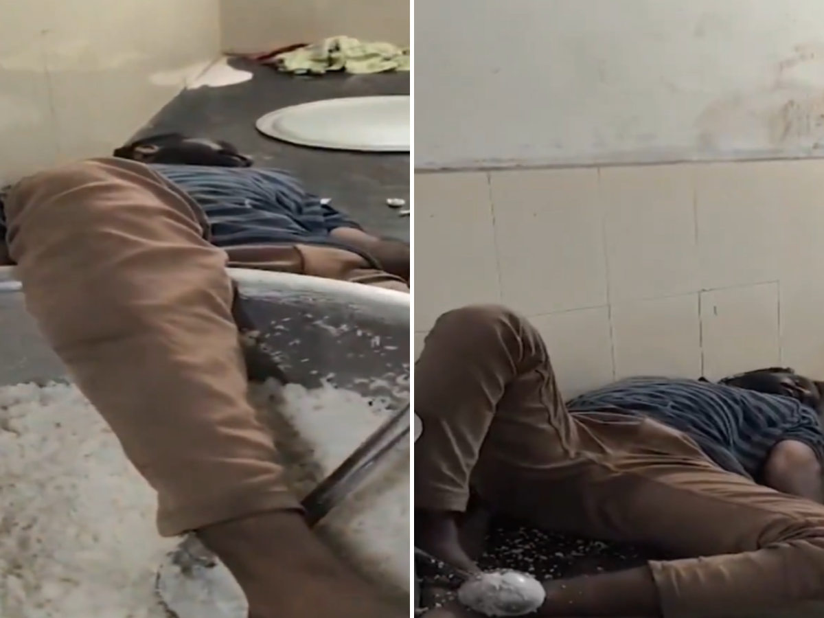 The viral video of the incident shows a man lying on a kitchen slab, deep in sleep (PHOTO: X)