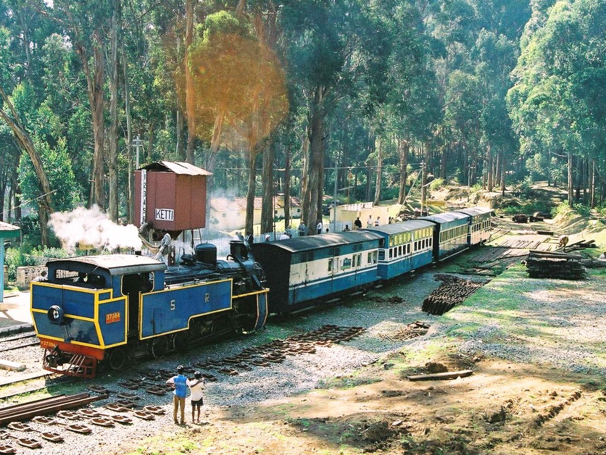 Nilgiri Mountain Railway offers a magical journey through misty hills