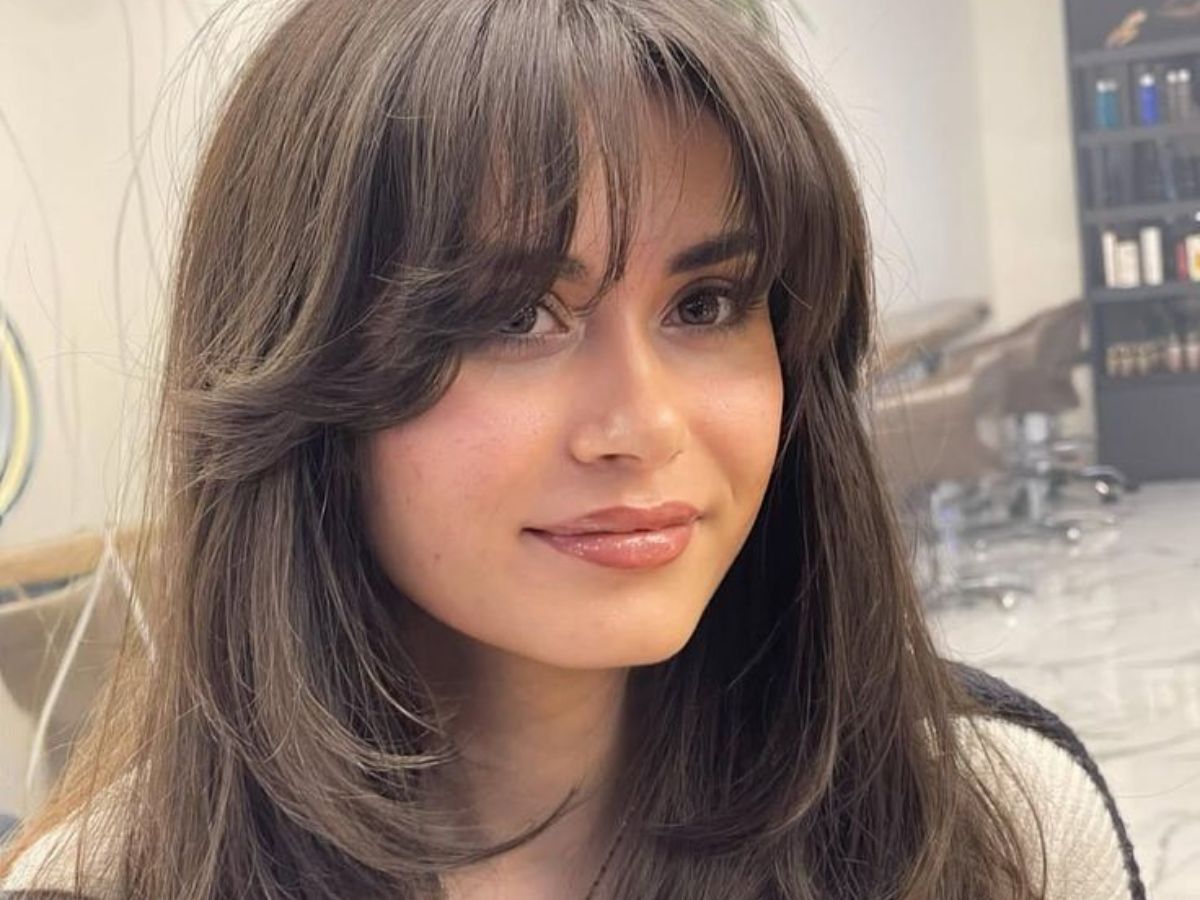 Long Layers with Curtain Bangs