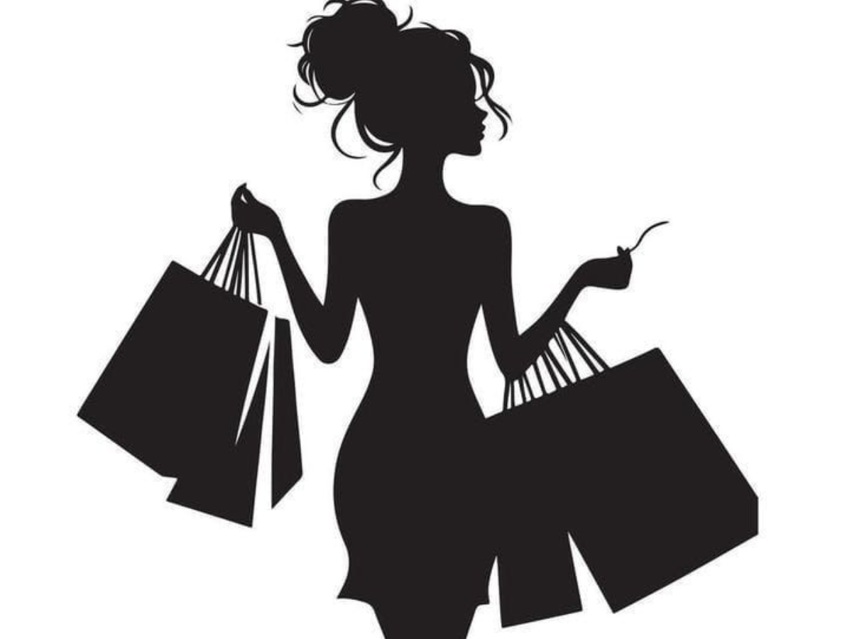 Stylish woman silhouette holding shopping bags, representing fashion, shopping, and luxury style trends