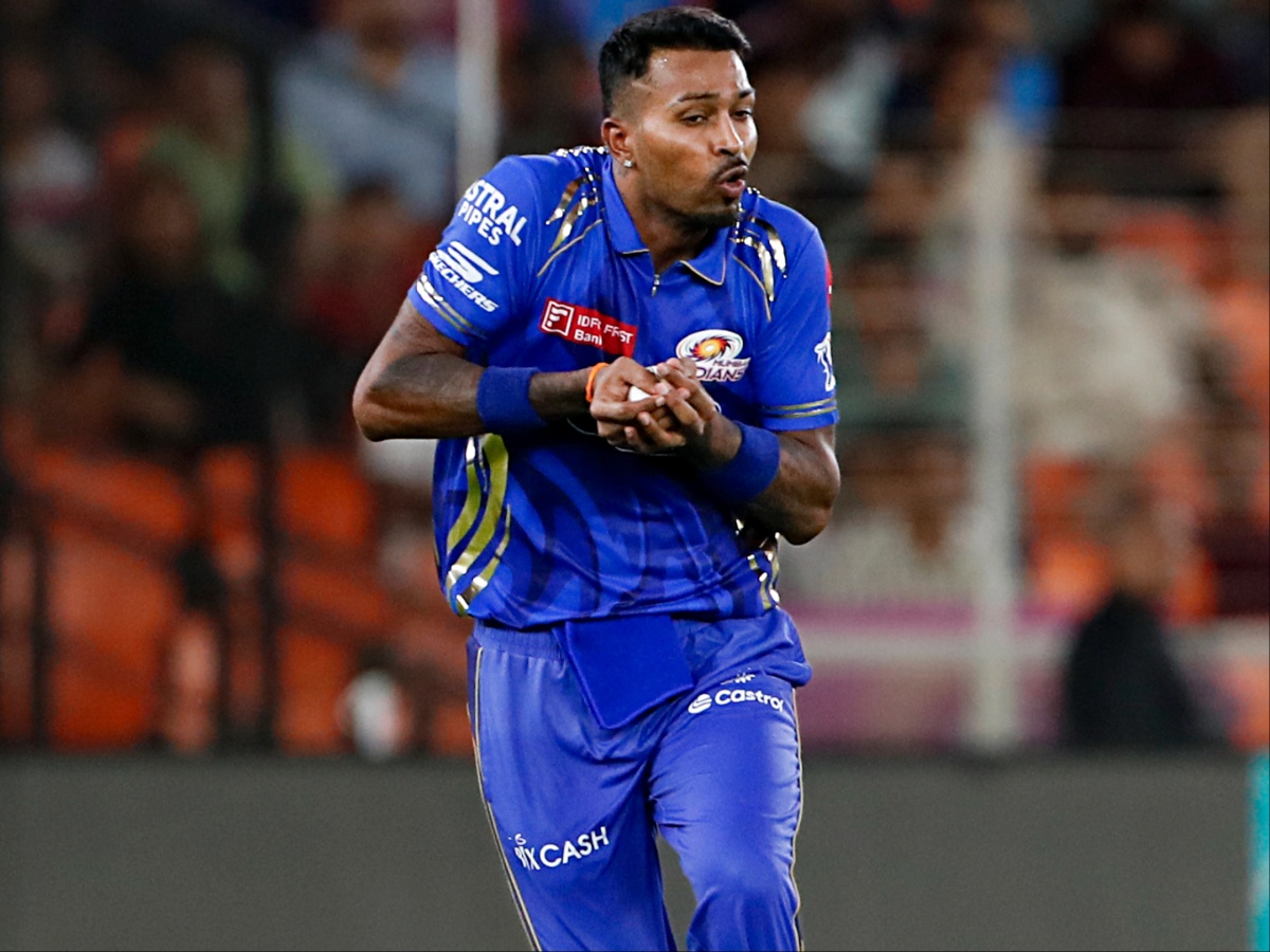 Hardik Pandya posing with the captain's armband during the MI 2026 kit launch