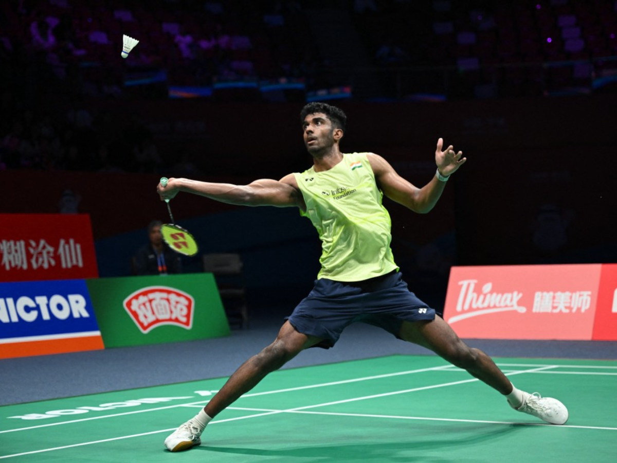 who-is-ayush-shetty-indian-shuttler-ends-8-year-medal-drought-in-mens-singles-at-badminton-asia-championships-2026 India's Ayush Shetty hits a return to Indonesia's Jonatan Christie during their men's singles quarter final match at the Badminton Asia Championship in Ningbo, eastern China's Zhejiang province on April 10, 2026. (Photo by CN-STR / AFP)