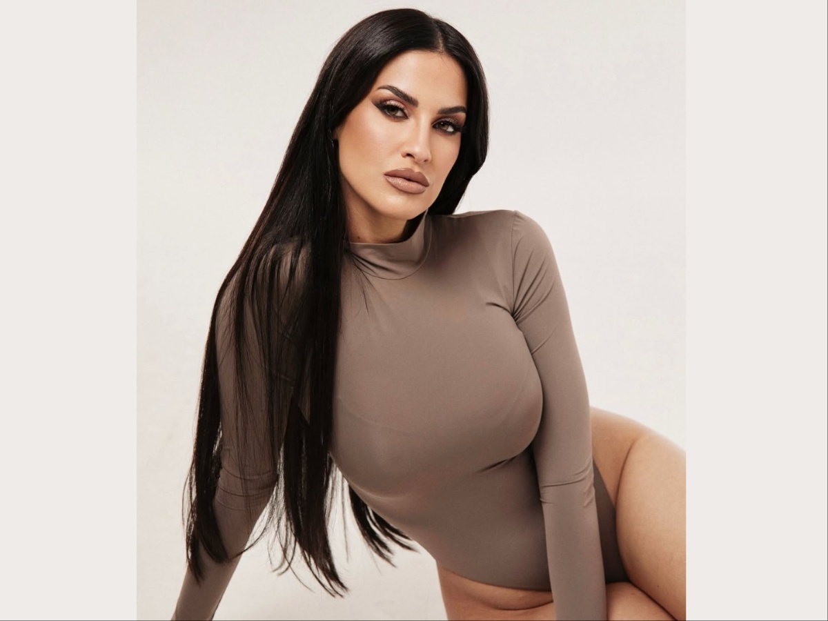 Eleonora Incardona and Samuele Ricci posing together on a red carpet at a luxury sports gala